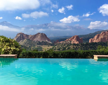 pool with mountains in the background