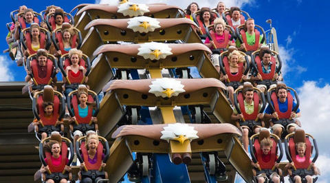 Large group of people riding rollercoaster